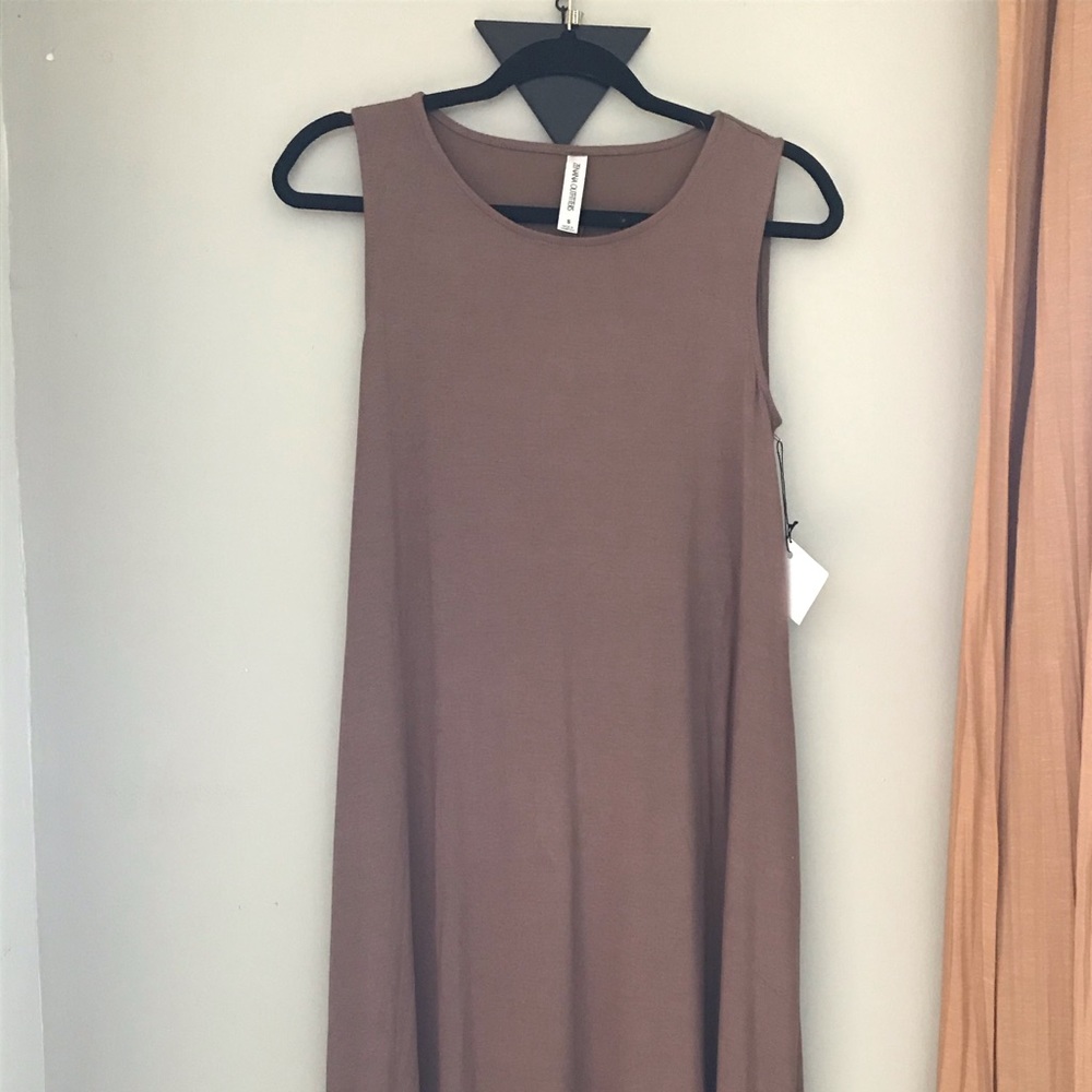 Tank dress with pockets.